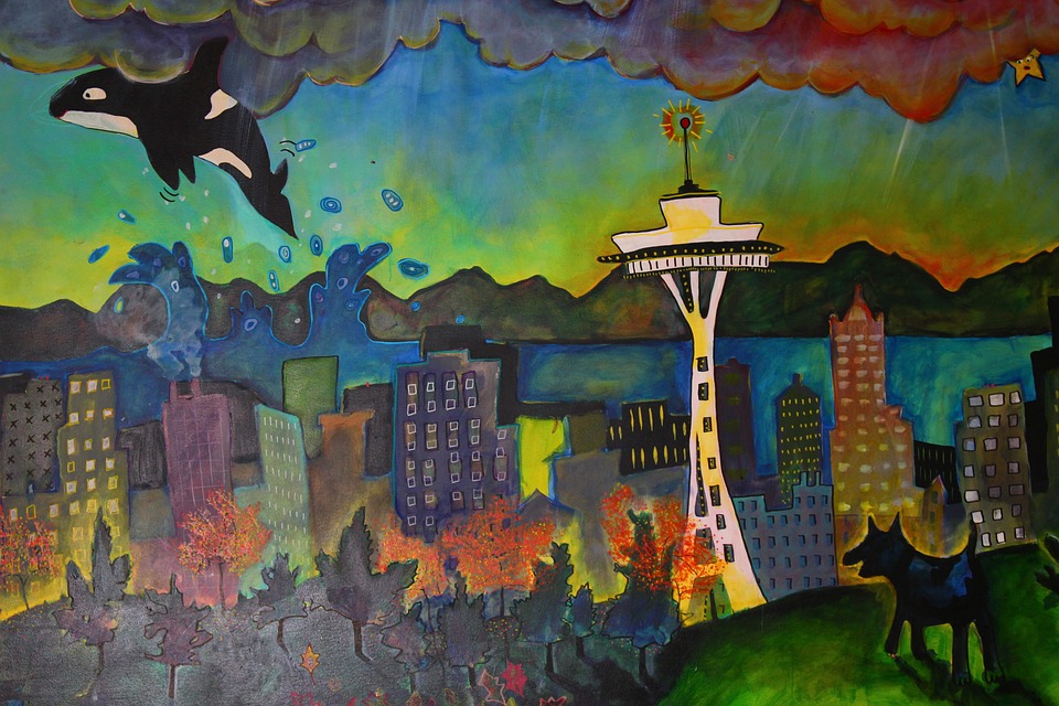 Painting of Seattle with a whale in the sky, space needle, and dog